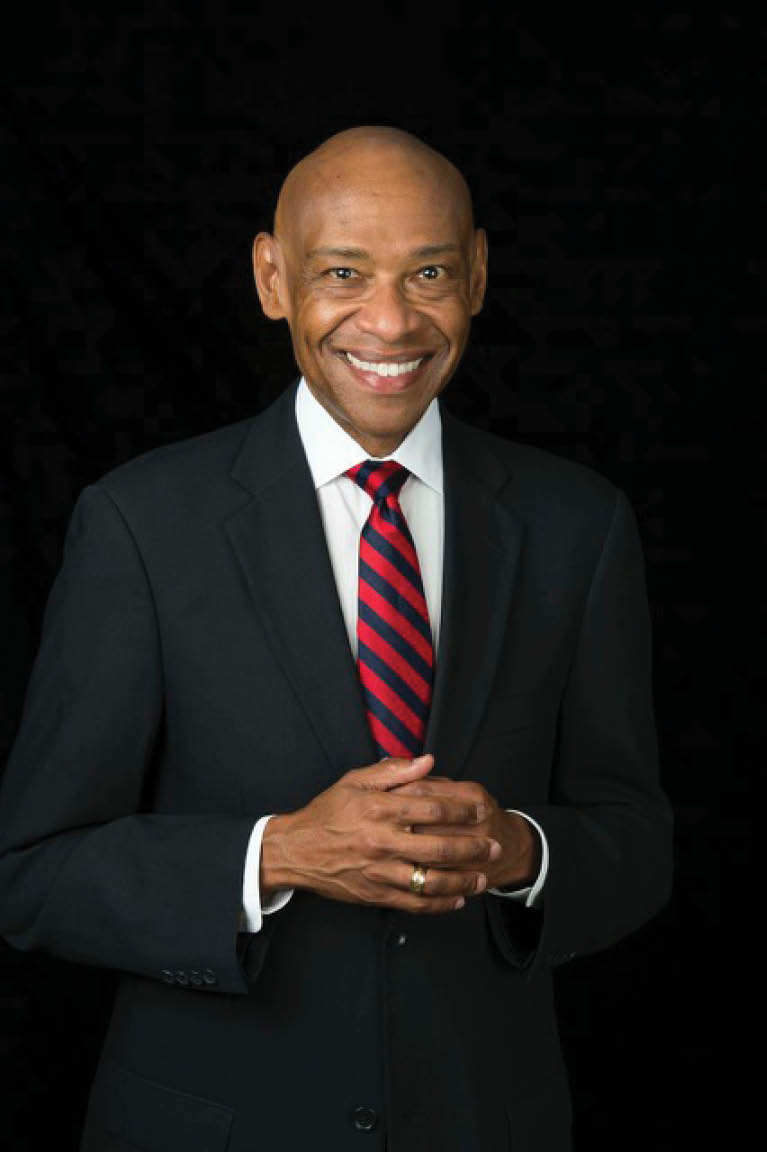 Dr. Gene Batiste,  