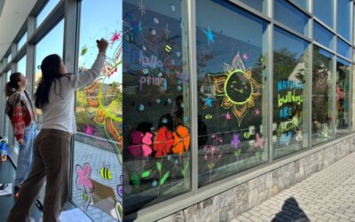 Art in Action Paints Windows for Bulldogs Are Beautiful Day